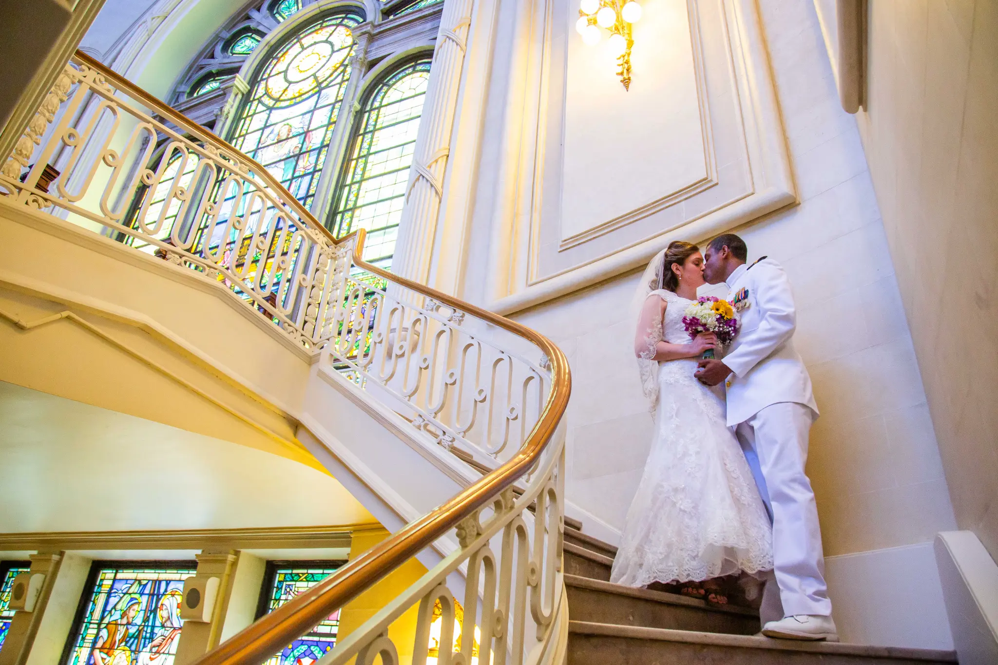 Bride and groom exchanging vows inside the Naval Academy Chapel — Andrew Rozario