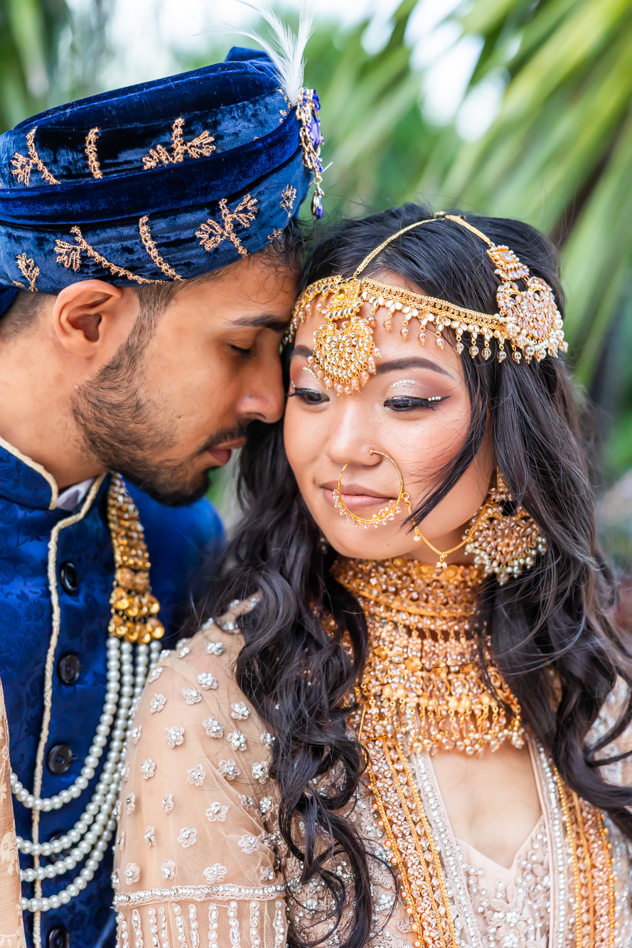South Asian couple close-up portrait at resort