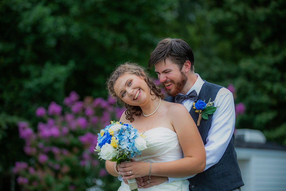 Couple laughing in garden