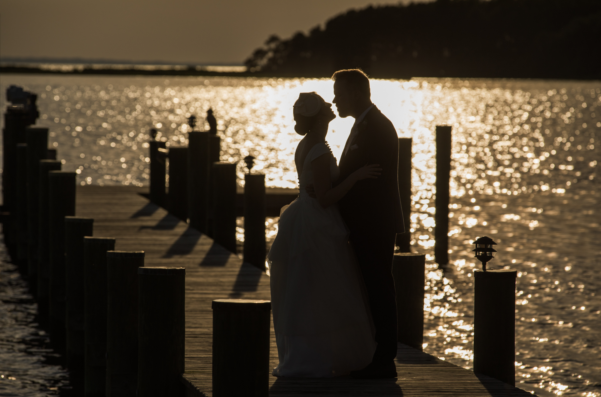 Intimate outdoor moment between bride and groom — Andrew Rozario