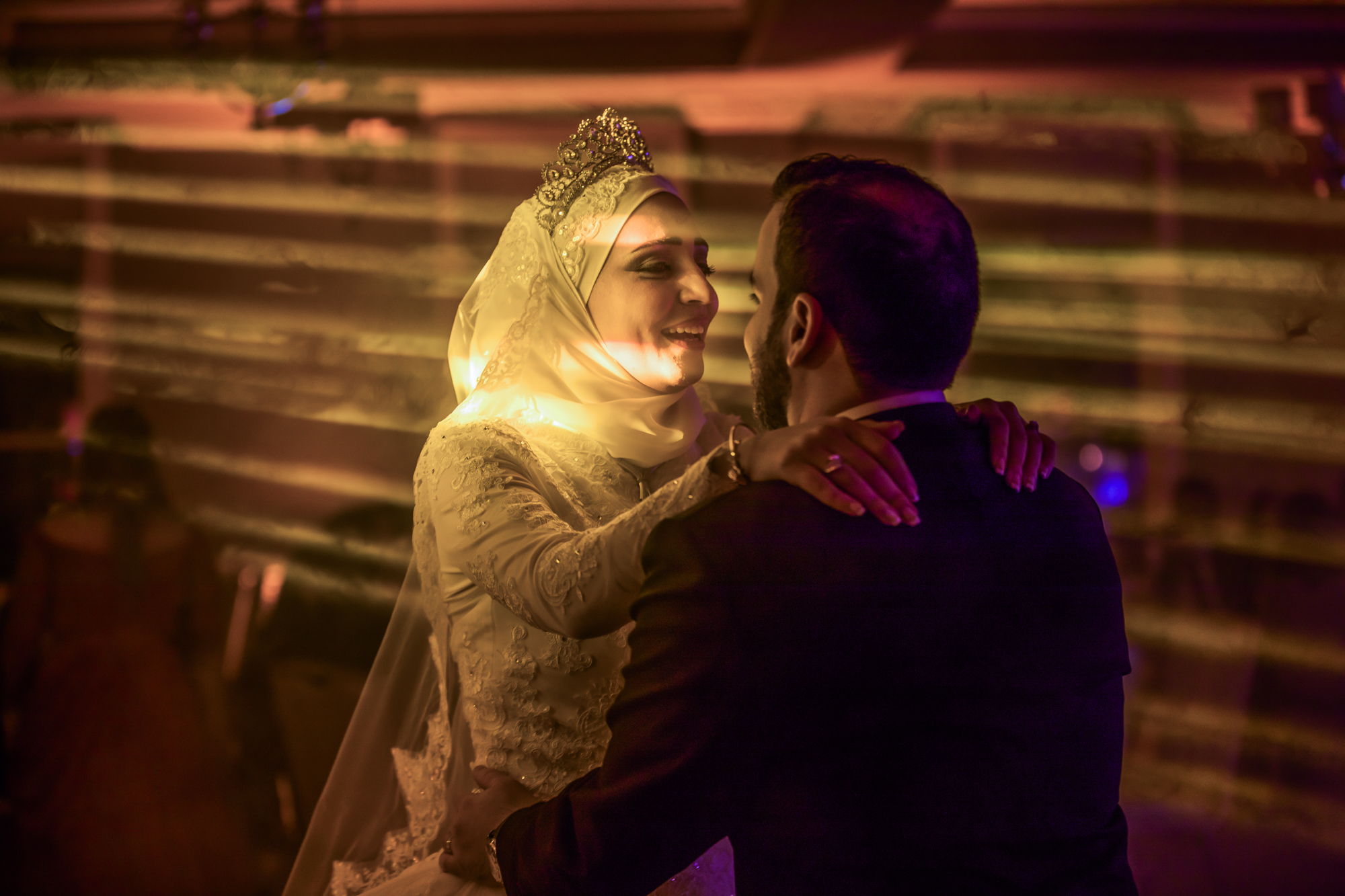 Muslim bride in golden spotlight at first dance